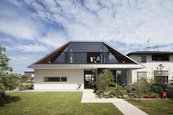 A Modern Hipped Roof House in Japan | Home Design Lover | Hip roof design,  Houses in japan, Hip roof